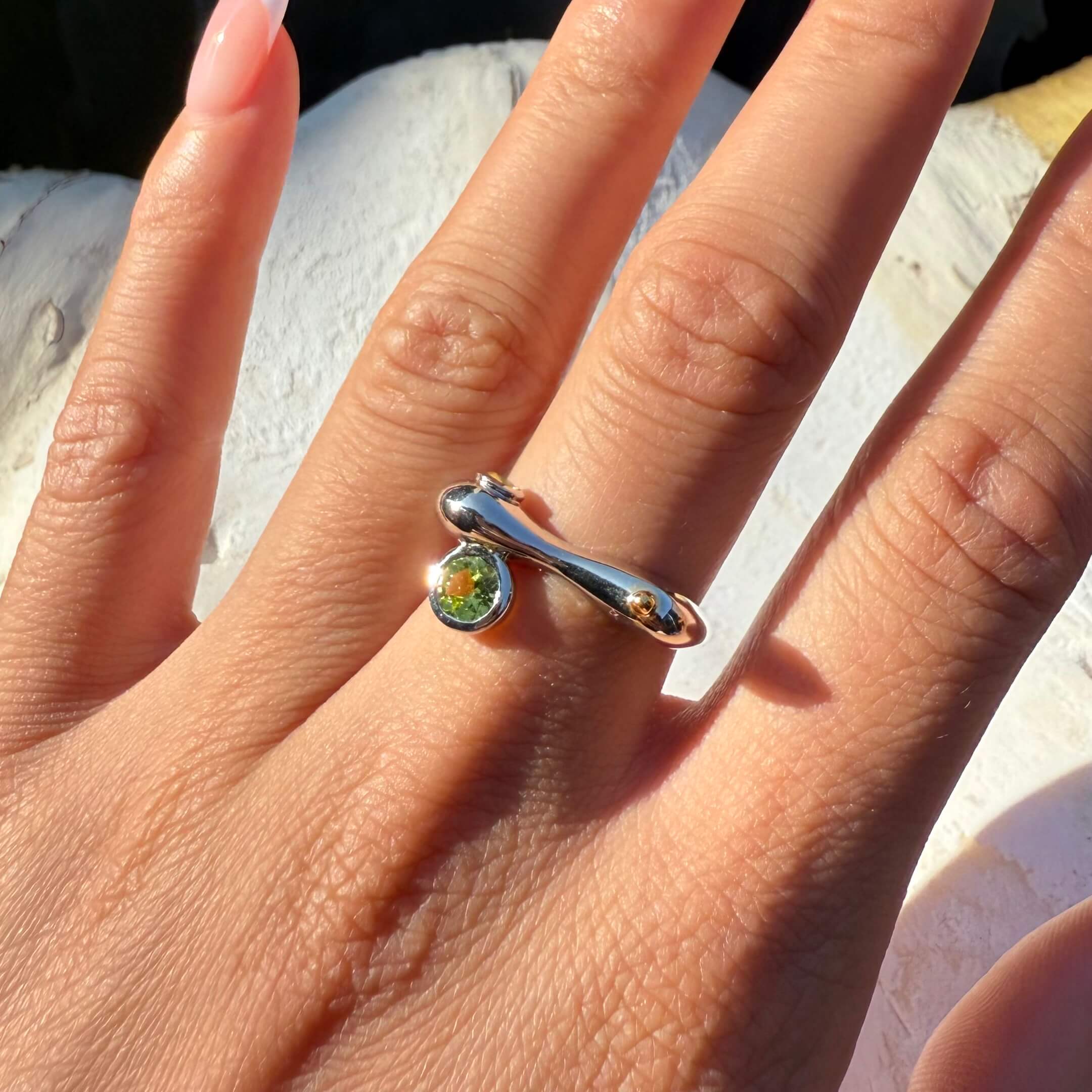 Peridot and citrine mix metal ring with silver band, gold accents, and dual gemstones